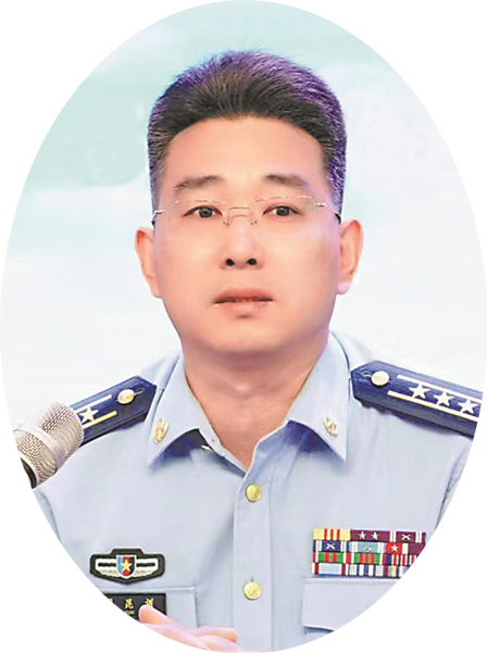  周昆训生前工作照。    舒兰市人武部供图